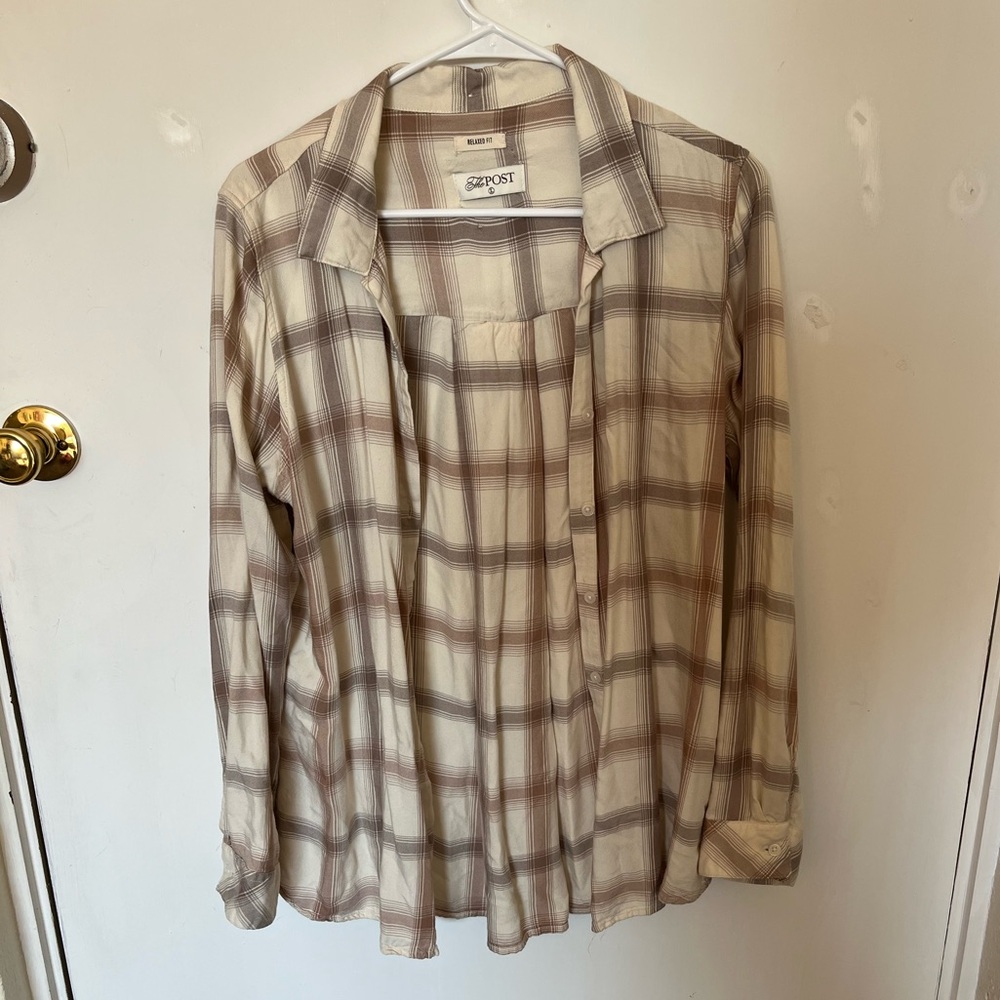 The post plaid button up